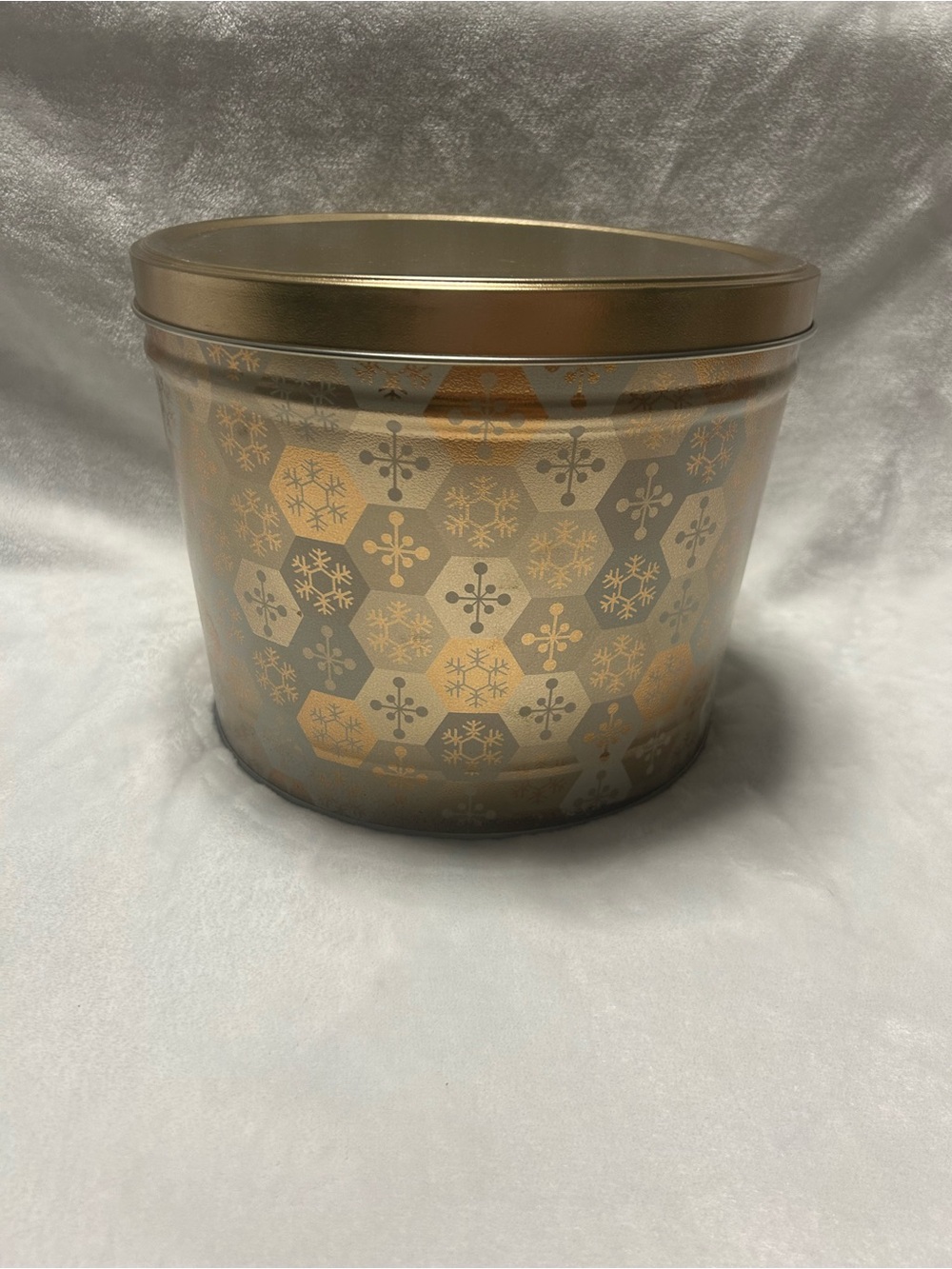 Independent Can Company large round gold snowflake storage container tin